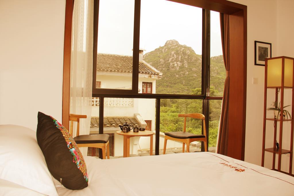 The Flower Hotel Guilin Værelse billede